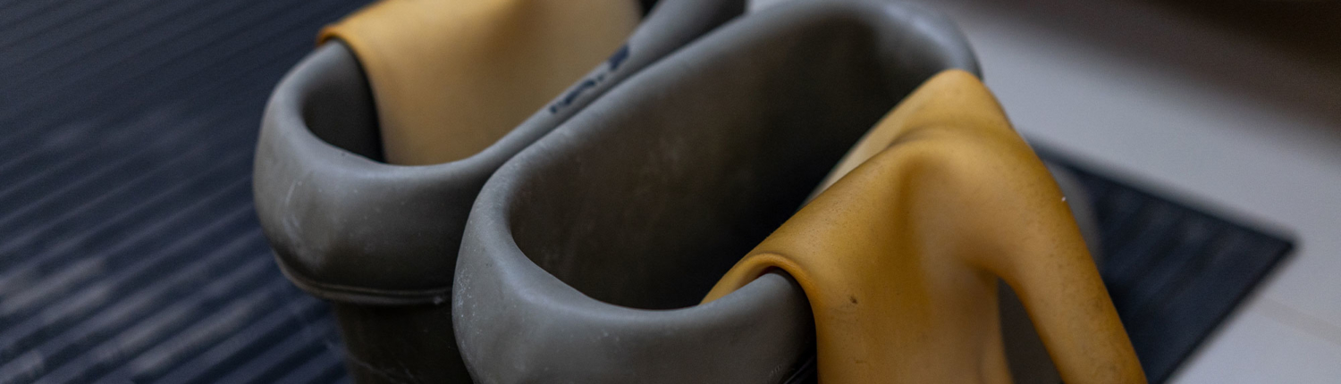 Rubber-boots,-galoshes-and-a-rug Rubber boots, galoshes, a rug