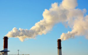 factory smoke producing pollution and carbon emissions