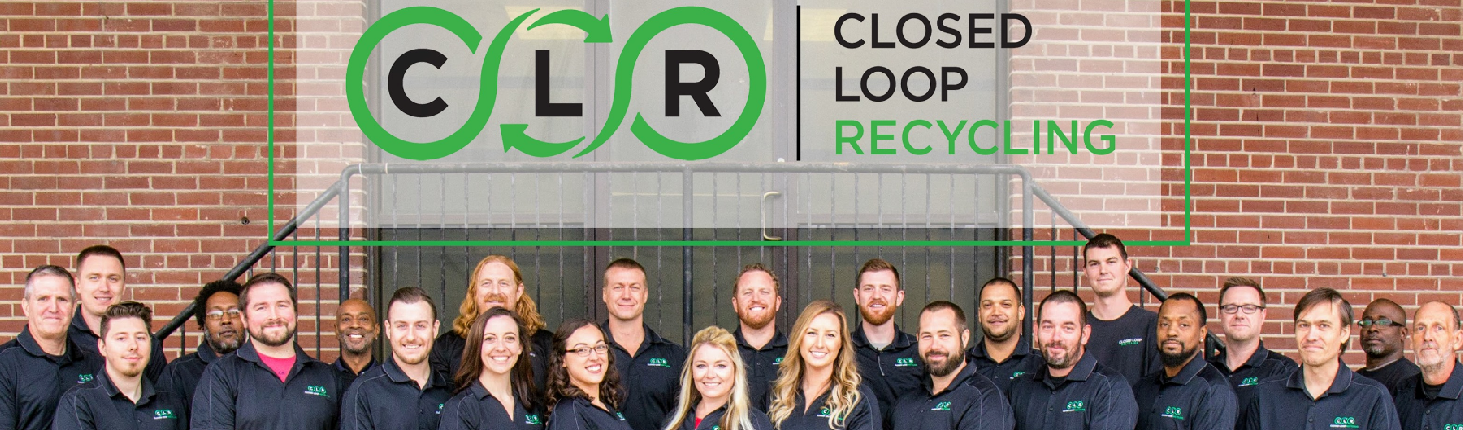 closed loop group photo of employees