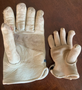 image of a regular reusable glove and a reusable glove that had been washed and dried
